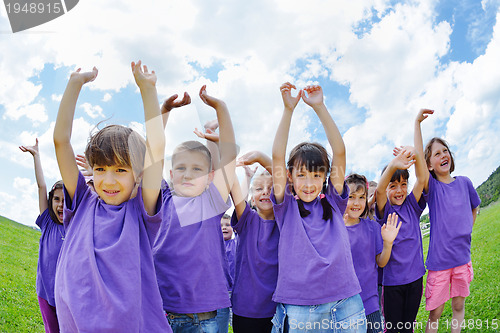Image of happy kids group  have fun in nature