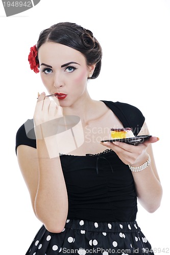 Image of beautiful young woman eat sweet cake