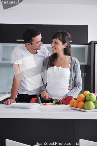 Image of young couple have fun in modern kitchen