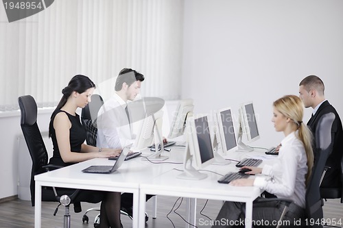 Image of business people group working in customer and help desk office