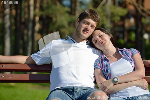 Image of romantic young couple in love together outdoor