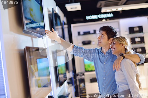 Image of people buy  in consumer electronics store