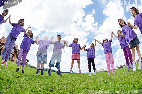 Image of happy kids group  have fun in nature
