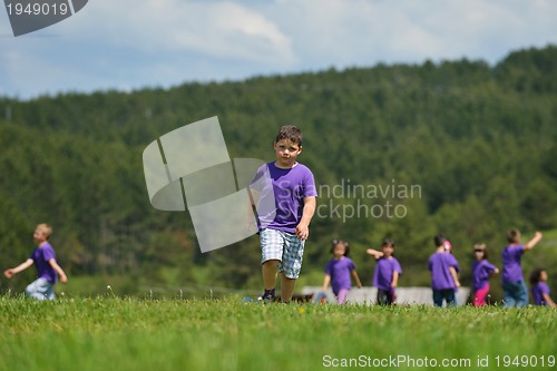 Image of happy kids group  have fun in nature