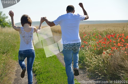 Image of happy couple in wheat field