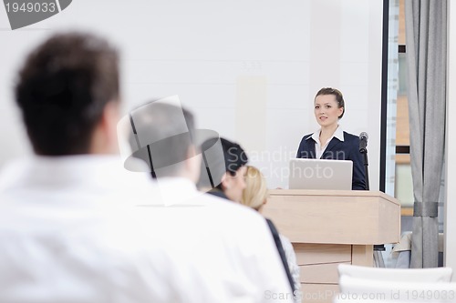 Image of business woman giving presentation