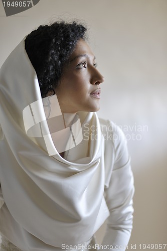Image of Portrait of a beautiful woman dressed as a bride