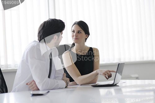 Image of business people in a meeting at office