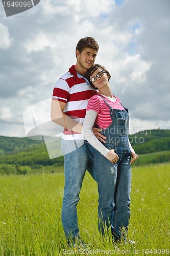 Image of romantic young couple in love together outdoor
