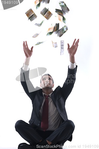 Image of Business man holding money