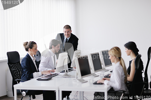 Image of business people group working in customer and help desk office