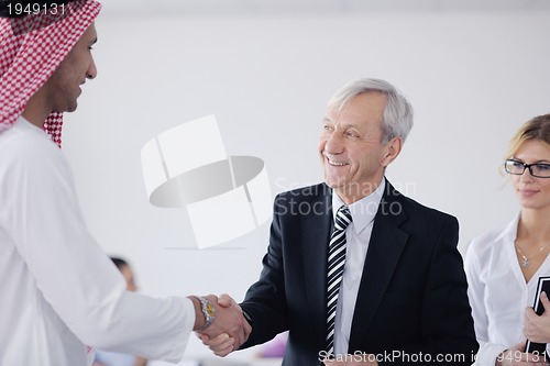 Image of Arabic business man at meeting