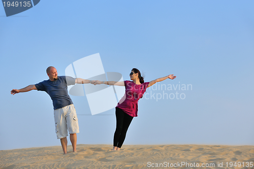 Image of couple enjoying the sunset