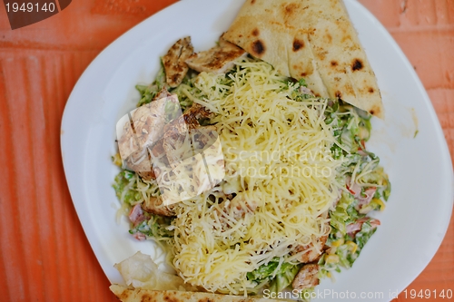 Image of woman eat salad