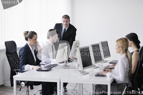 Image of business people group working in customer and help desk office