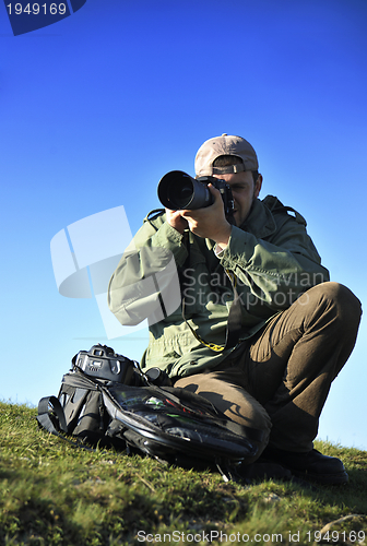 Image of Nature photographer with digital camera