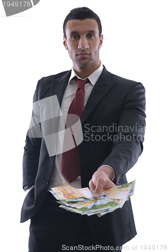 Image of Business man holding money