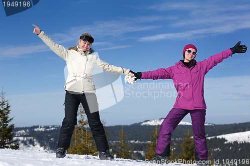 Image of winter season fun with group of girls