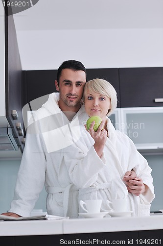 Image of young couple have fun in modern kitchen
