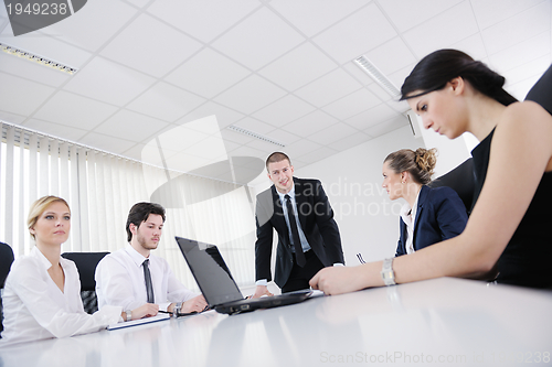 Image of business people in a meeting at office