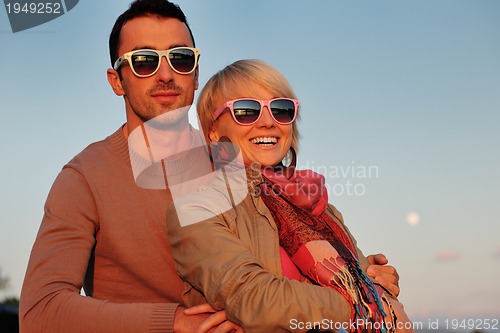 Image of couple in love  have romantic time on boat