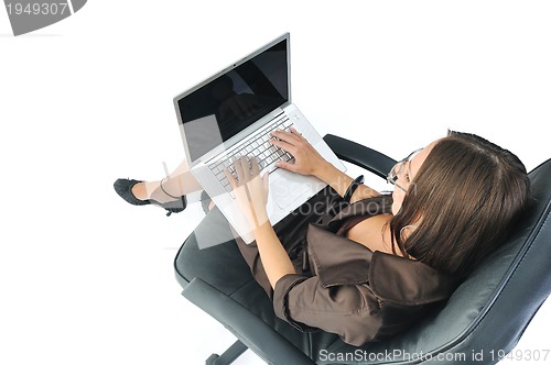 Image of business woman with laptop isolated on white