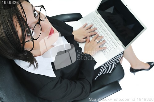 Image of business woman with laptop isolated on white