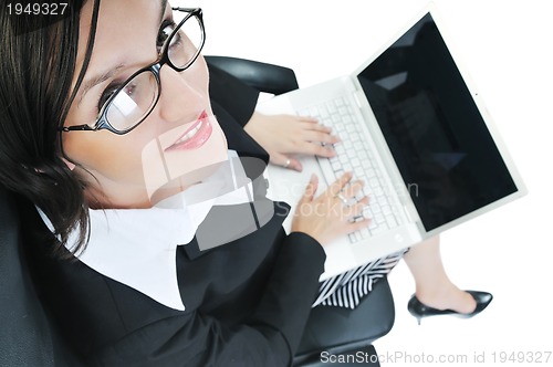 Image of business woman with laptop isolated on white