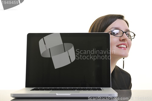 Image of business woman working on laptop isolated on white