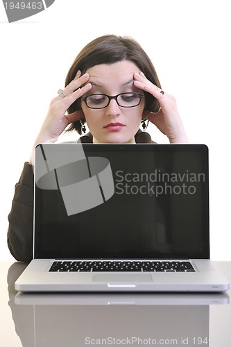 Image of business woman working on laptop isolated on white