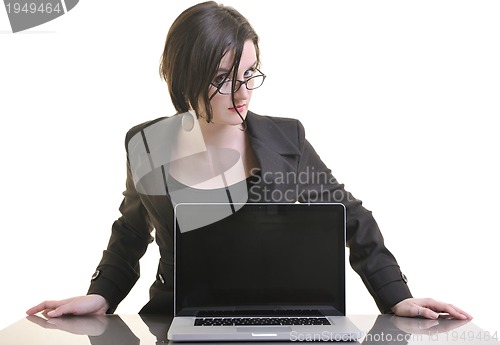 Image of business woman working on laptop isolated on white