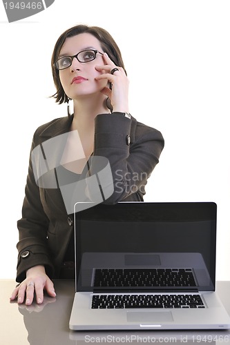 Image of business woman working on laptop isolated on white