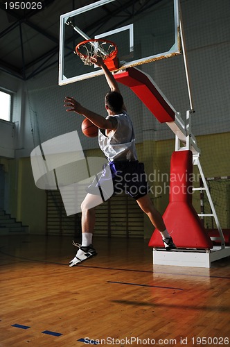 Image of basket ball game player at sport hall