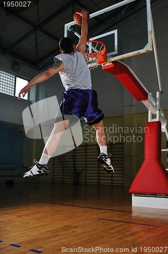 Image of basket ball game player at sport hall