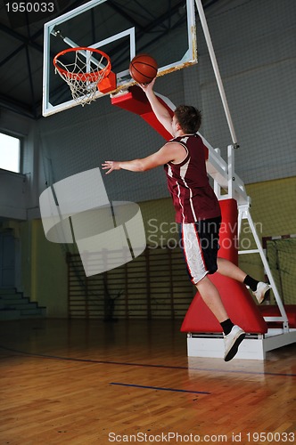 Image of basket ball game player at sport hall