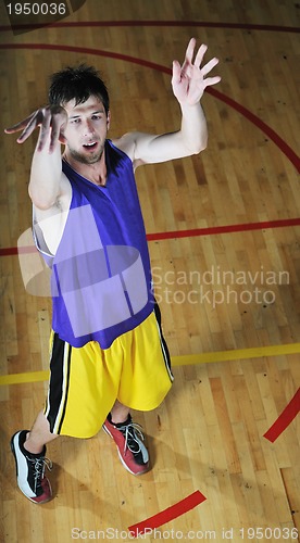 Image of basket ball game player at sport hall