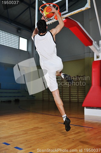 Image of basket ball game player at sport hall