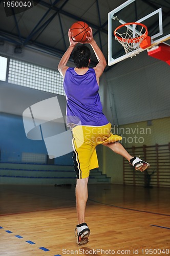 Image of basket ball game player at sport hall