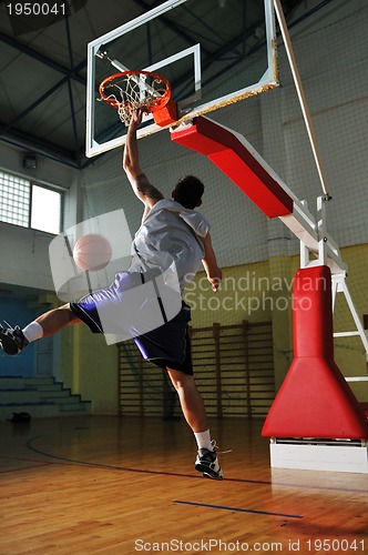 Image of basket ball game player at sport hall