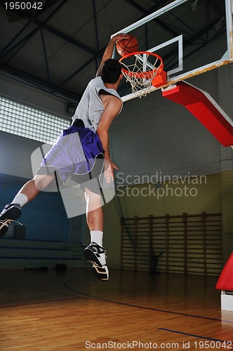 Image of basket ball game player at sport hall