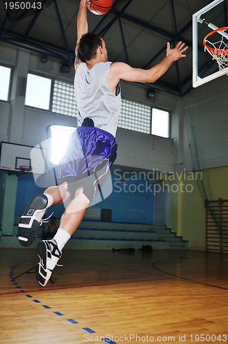 Image of basket ball game player at sport hall