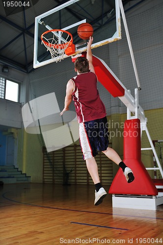 Image of basket ball game player at sport hall