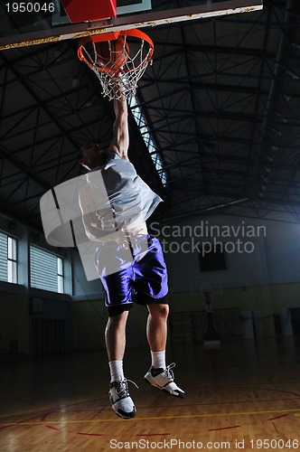 Image of basket ball game player at sport hall