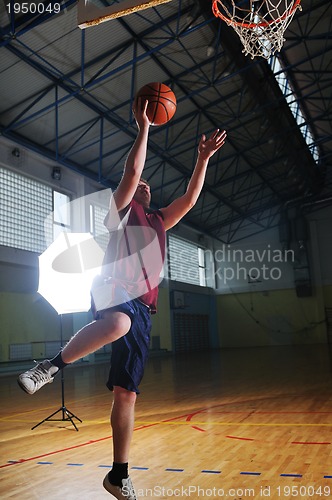 Image of basket ball game player at sport hall