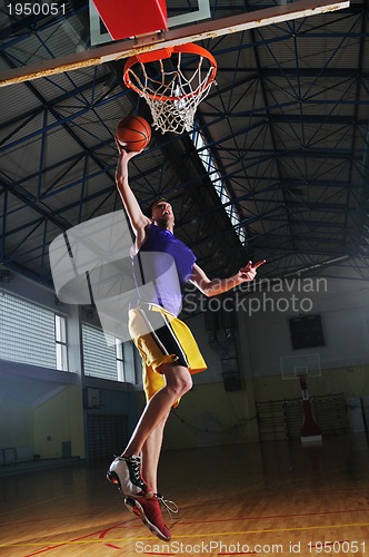 Image of basket ball game player at sport hall