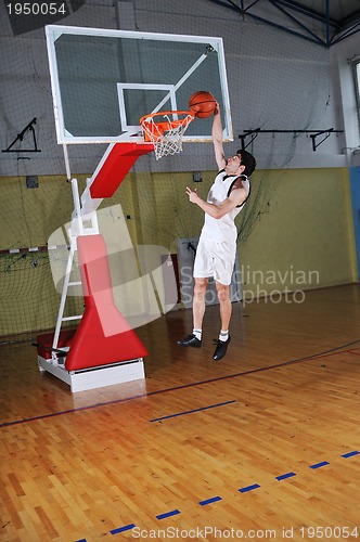 Image of basket ball game player at sport hall