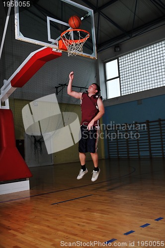 Image of basket ball game player at sport hall