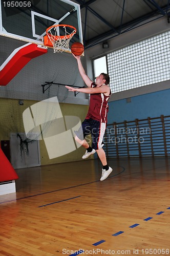 Image of basket ball game player at sport hall