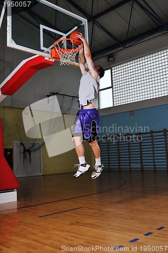 Image of basket ball game player at sport hall