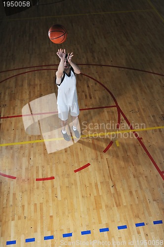 Image of basket ball game player at sport hall